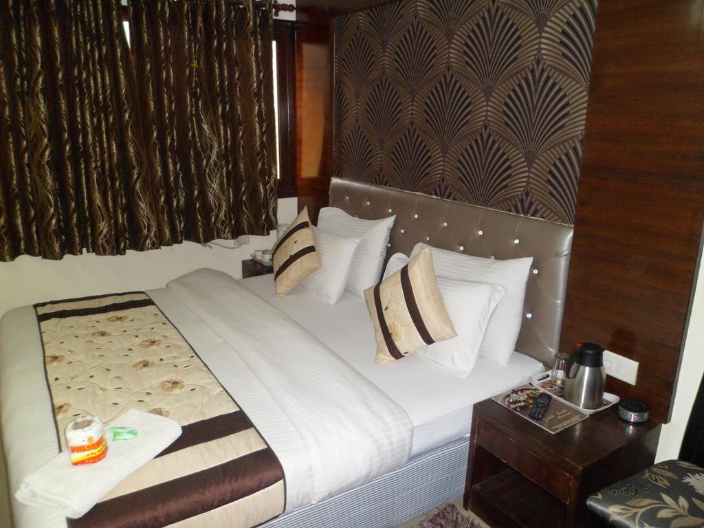 Hotel Arjun Ню Делхи Стая снимка