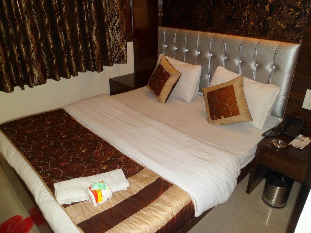 Hotel Arjun Ню Делхи Стая снимка